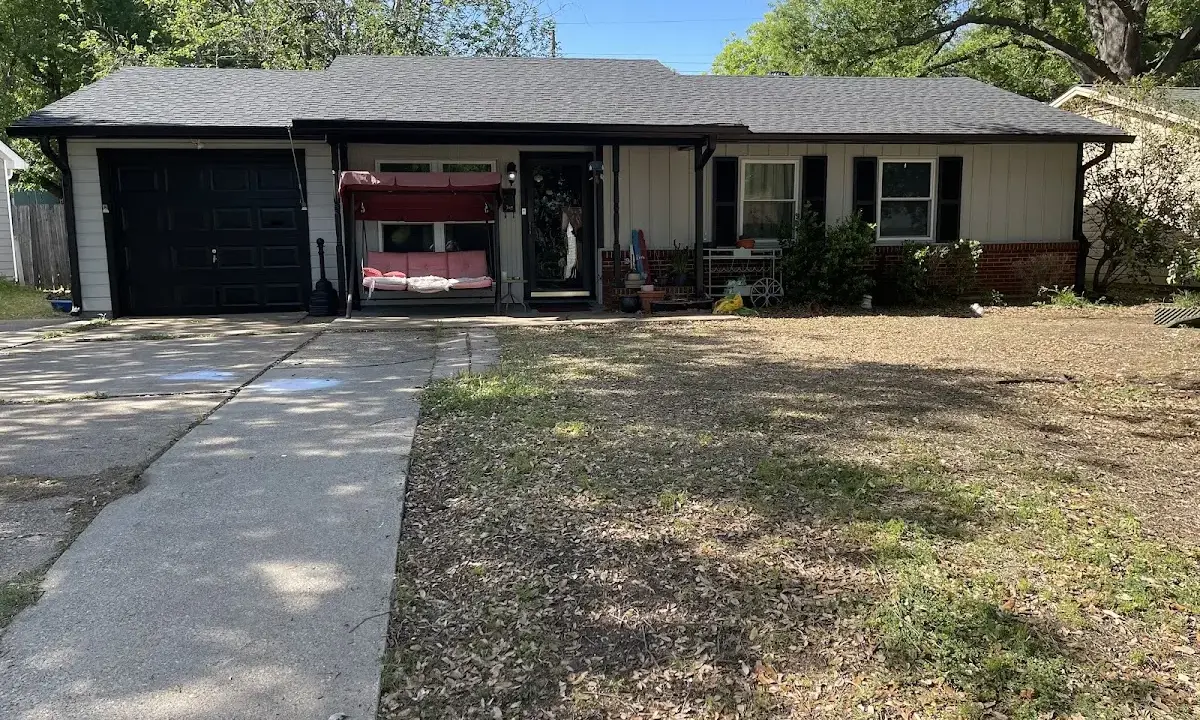 Asphalt Shingle Roof Repair crew at work on a residential roof in Cinco Ranch